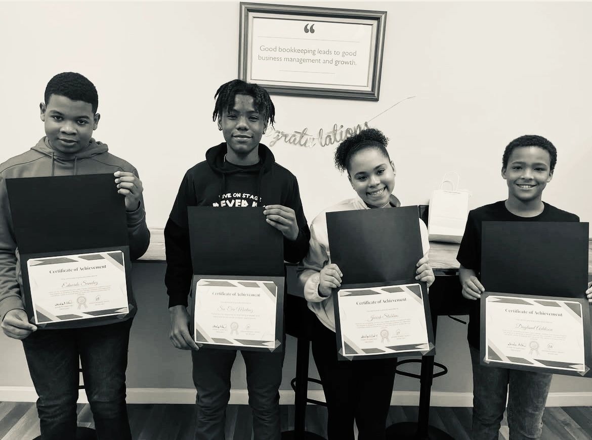 Youth graduates with bookkeeping certificates
